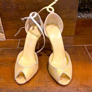 Women’s gold and silver high heels
